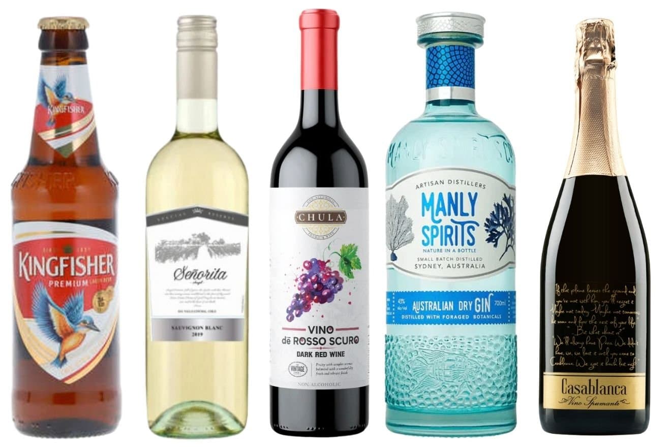 Alcohol & Indian Food: What Goes Well and What Doesn’t 1 A selection of various wines and champagnes displayed in elegant glasses, showcasing different colors and labels.
